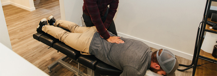 Chiropractor Bellingham WA Andrew Murry With Back Pain Patient